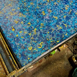 How is Paper Marbled?